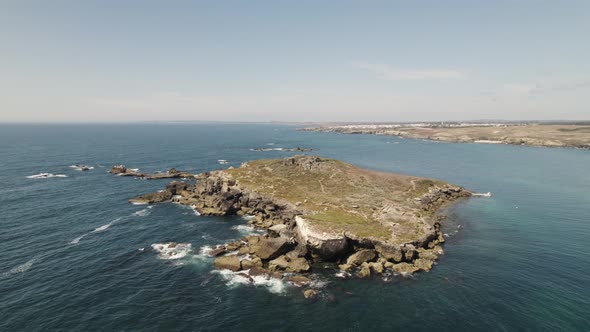 Pessegueiro island, Porto Covo in Portugal. Aerial orbit