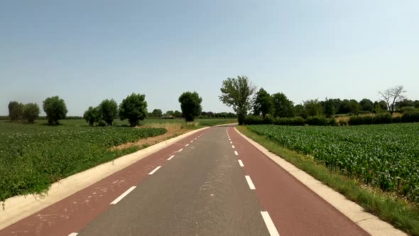 POV Driving on motorcycle on a scenic road in South Limburg, the Netherlands