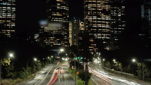 Timelapse of Sydney's skyline and highway (M1) near Royal Botanic Garden during night, New South Wal