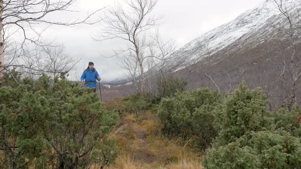 A Man Travels in a Mountain Hike. Stopped and Admires the Mountains. Active Life