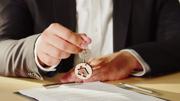 Real Estate Agent Holding Home Keys Closeup Man Realtor