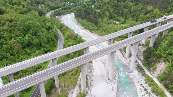 Aerial View of the Concrete Highway Viaduct on Concrete Pillars in the Mountains