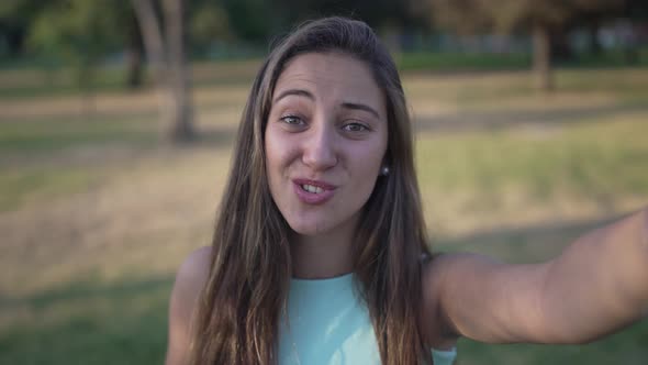 a Cute White Girl Smiling and Talking in Front of the Camera Practicing Acting