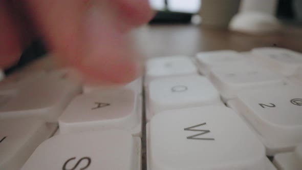 Closeup Moving Macro Shot Typing On Laptop Keyboard