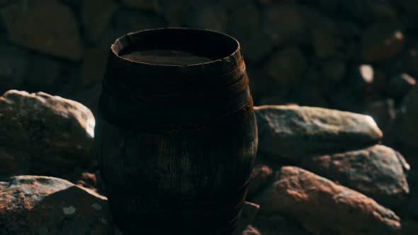 Old Wooden Barrel on the Rocks