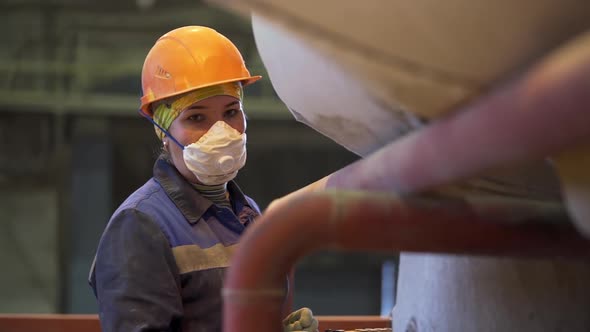 Portrait of a women worker at the factory