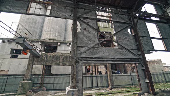 Inside ruined factory. Old industrial building for demolition.