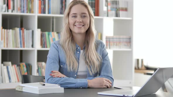 Smiling Young Woman in Office