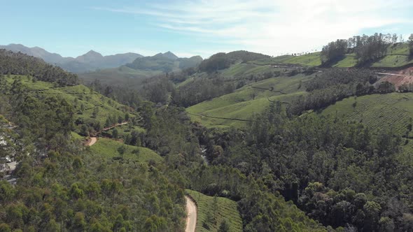 A vast valley of the Western Ghats mountain range near the countryside tea plantation of Munnar