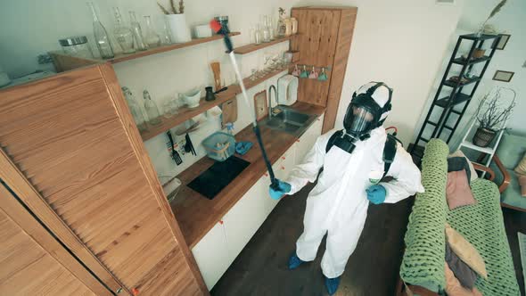 Disinfector in a Hazmat Suit Is Doing Sanitation at Home