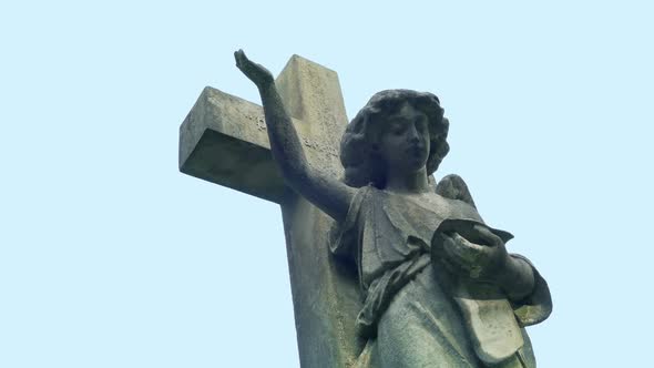 Gravestone Angel Figure In The Daytime