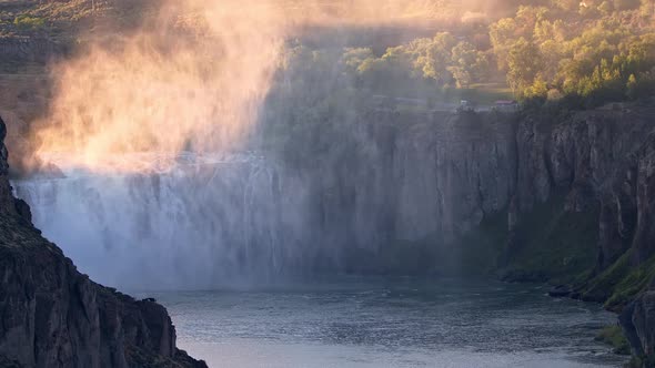 Zoomed view of Shoshone Falls and viewing area as mist rises