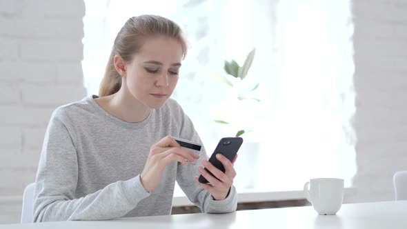 Online Shopping on Smartphone By Young Woman