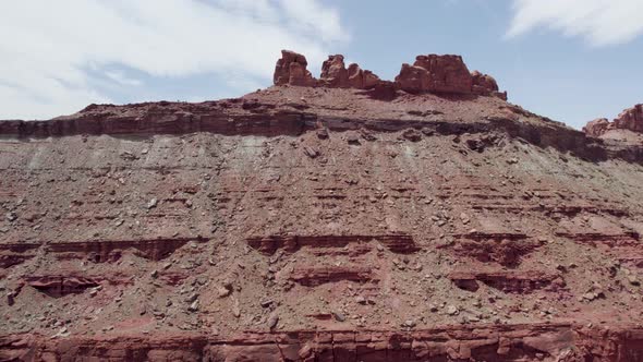 Aerial landscape Moab, Utah. Dry canyon and sediments with massive red rock formations. USA