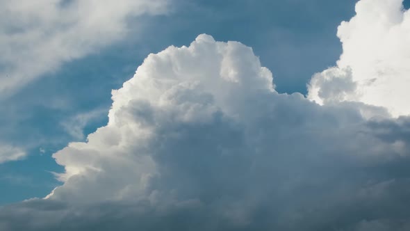 Timelapse of White Puffy Cumulus Clouds Forming on Summer Blue Sky