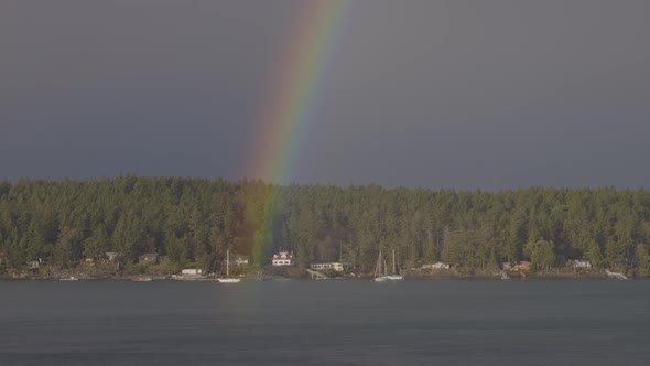 Double Rainbow in the Cloudy Sky Over the Pacific Ocean and Gulf Islands
