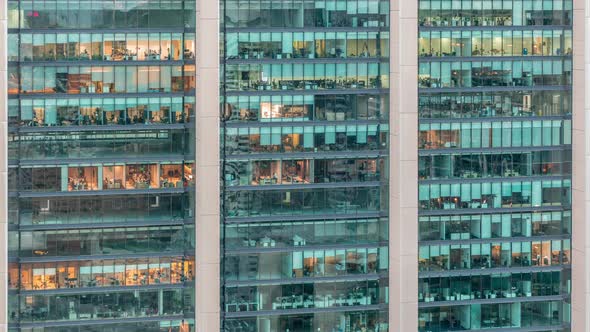 Big Glowing Windows in Modern Office and Residential Buildings Day to Night Timelapse