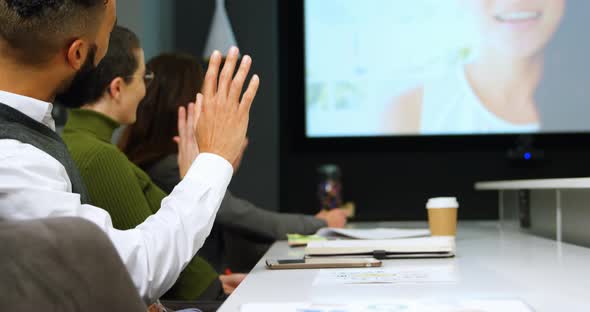 Executives interacting through video call in conference 4k