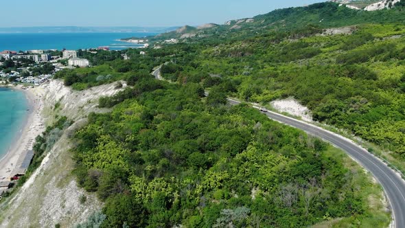 Vehicle Driving On Coastal Road In The Hill At The Coast Of Heros Beach In Balchik, Bulgaria