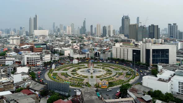 Sathorn intersection or junction with cars traffic, Bangkok Downtown, Thailand.