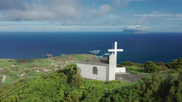 Aerial View of Charming White Church on the Hill of the Remote Archipelago