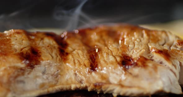 Roasted Turkey Fillet with Hot Steam in a Frying Pan