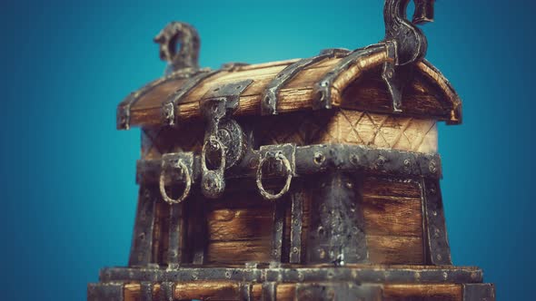 Closed Wooden Treasure Chest with Metal Clasp alt