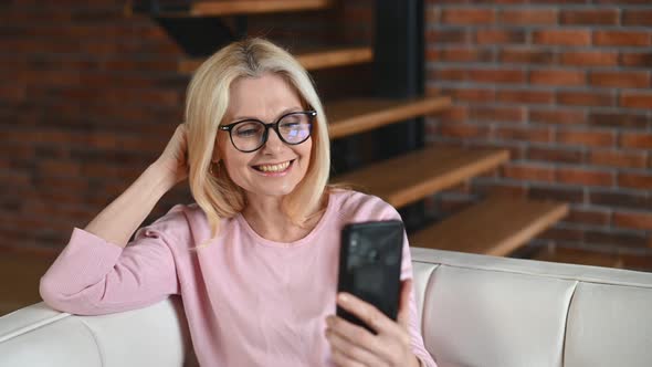 A Middleaged Woman in the Home Office