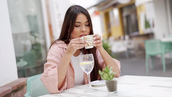 Happy Woman with Cup of Coffee