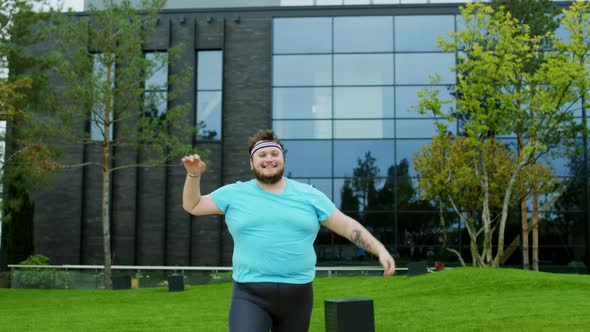 Dancing Funny Obese Guy After a Hard Workout He
