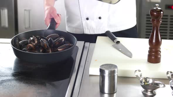 Chef Cooking Mussels