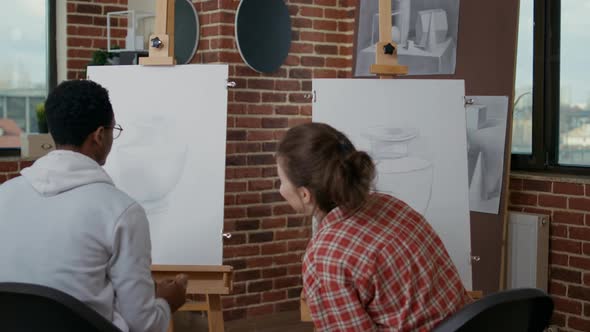 Multi Ethnic Team of People Learning to Draw Sketch in Art Class