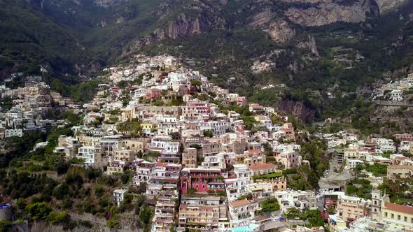 Positano town in the Italian Amalfi coastline with hillside mansions and hotels built on the cliff,