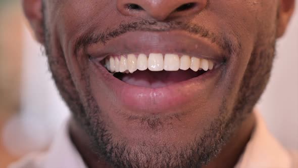 Close Up of Lips of Smiling African Man