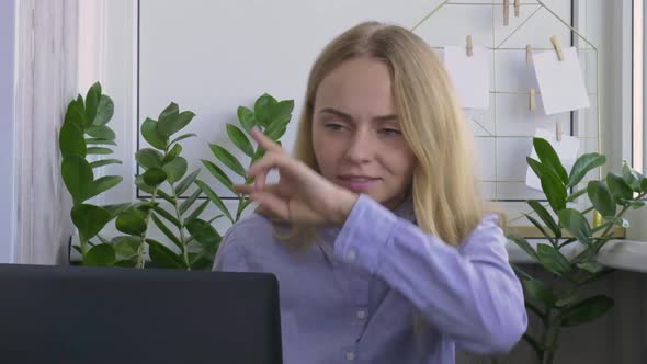 Young Woman Working on a Computer at Home