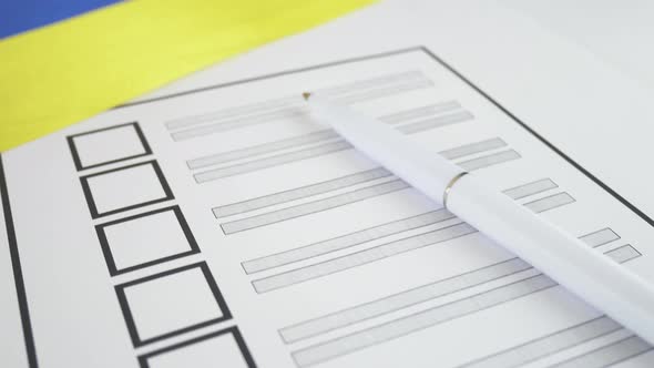 Voting Ballot Paper with White Pen in Ukraine