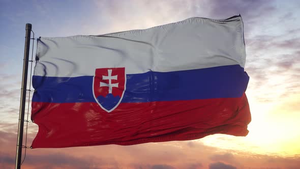 Flag of Slovakia Waving in the Wind Against Deep Beautiful Sky at Sunset