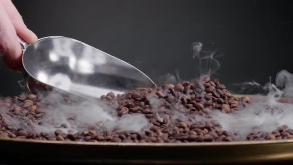 Metal Scoop Mixing Roasting Coffee Beans Close Up