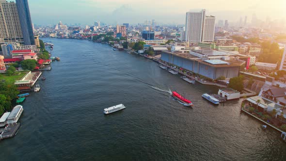 4K UHD : Bangkok River drone view. Flying over the Chao Phraya River