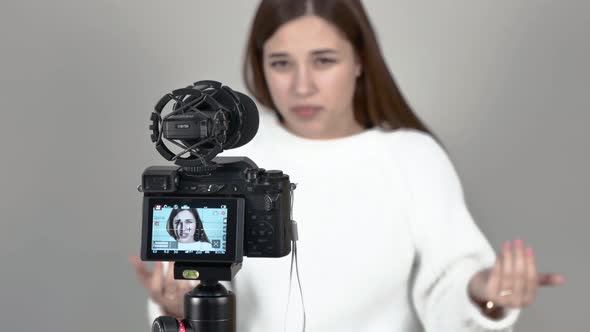 Girl Speaks in Front of Camera She Is Out of Focus Close Up Camera Turned on