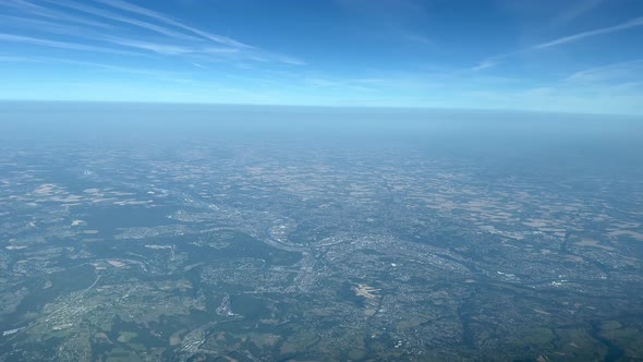 Aerial view of Liège City (Belgium), at 7000m high from a jet cockpit during in a splendid summer m