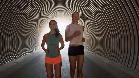 Young Women or Female Friends Running Outdoors