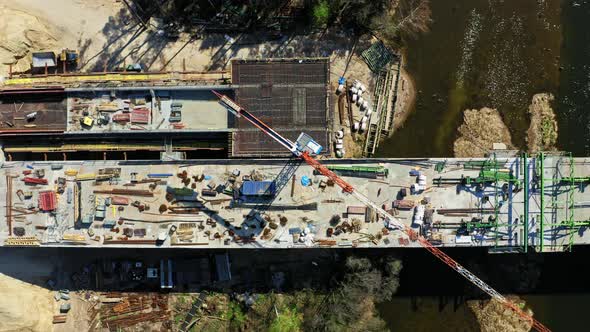 Big construction of a bridge with high crane, aerial view, Poland