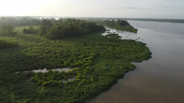 Aerial view silhouette Sungai Perak river bank