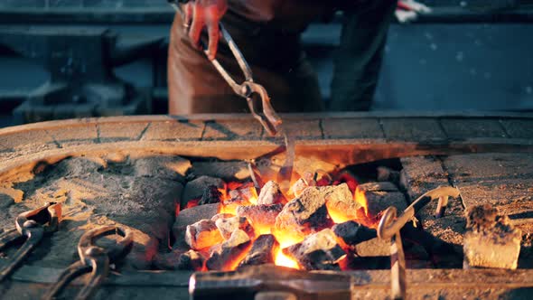 Furnace with Metal Tools Getting Heated