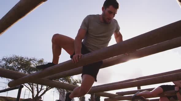 Young adults training at an outdoor gym bootcamp