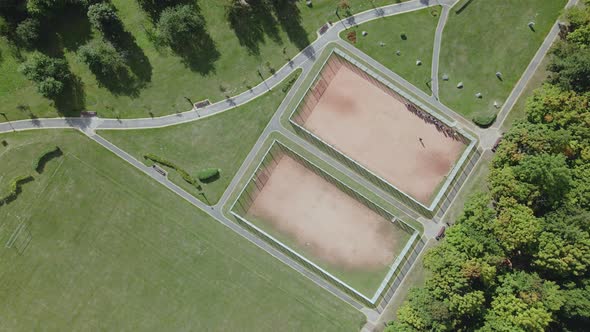 Walking paths and sports grounds in the park area. Aerial photography.