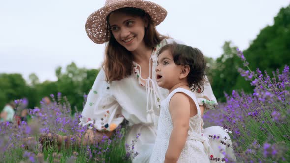 Mother Playing with Baby in Lavender Field