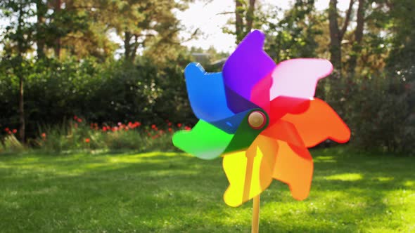 Colorful Pinwheel Rotating Outdoors in Summer