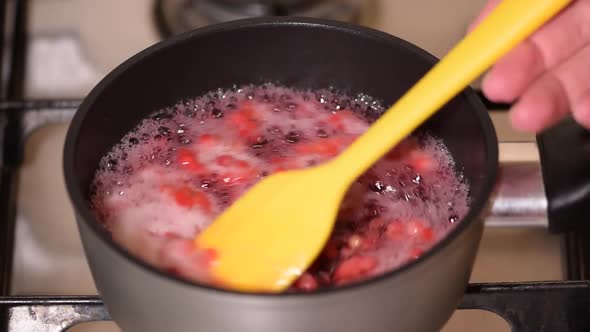 Pot with Compote of Fresh Berries on Stove